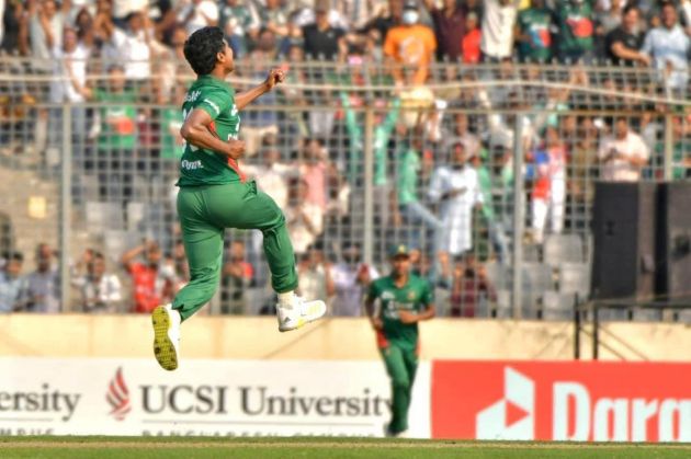 Hasan Mahmud leaps in delight.