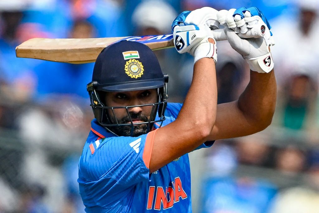 Rohit tees off.