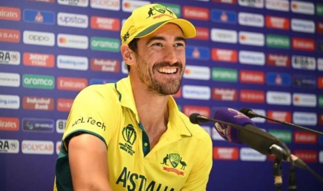 Mitchell Starc smiles.