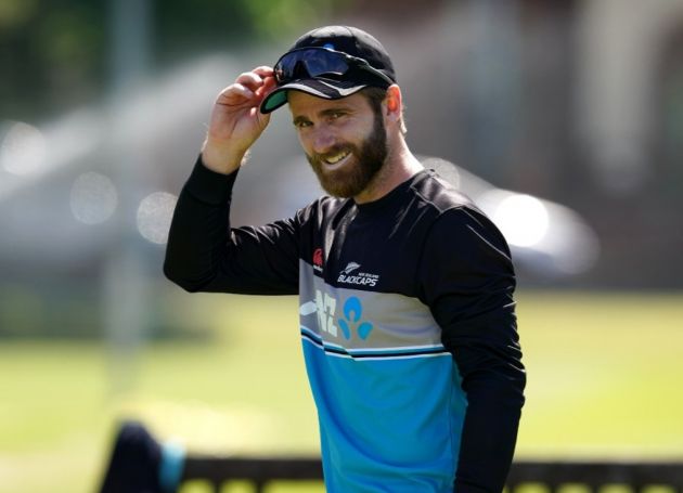 Kane Williamson applauds his team.