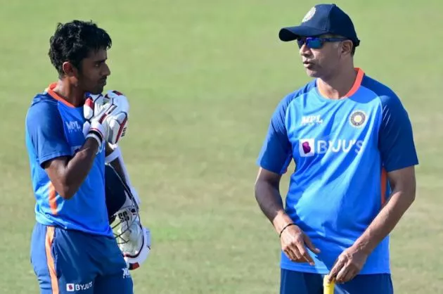 Abhimanyu Easwaran takes feedback from Indian head coach Rahul Dravid.