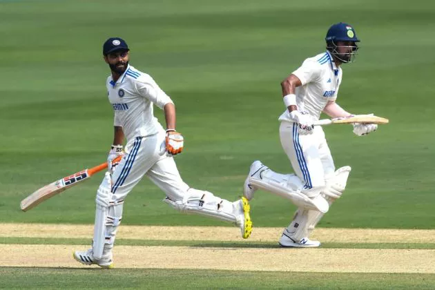 Jadeja and Rahul return.